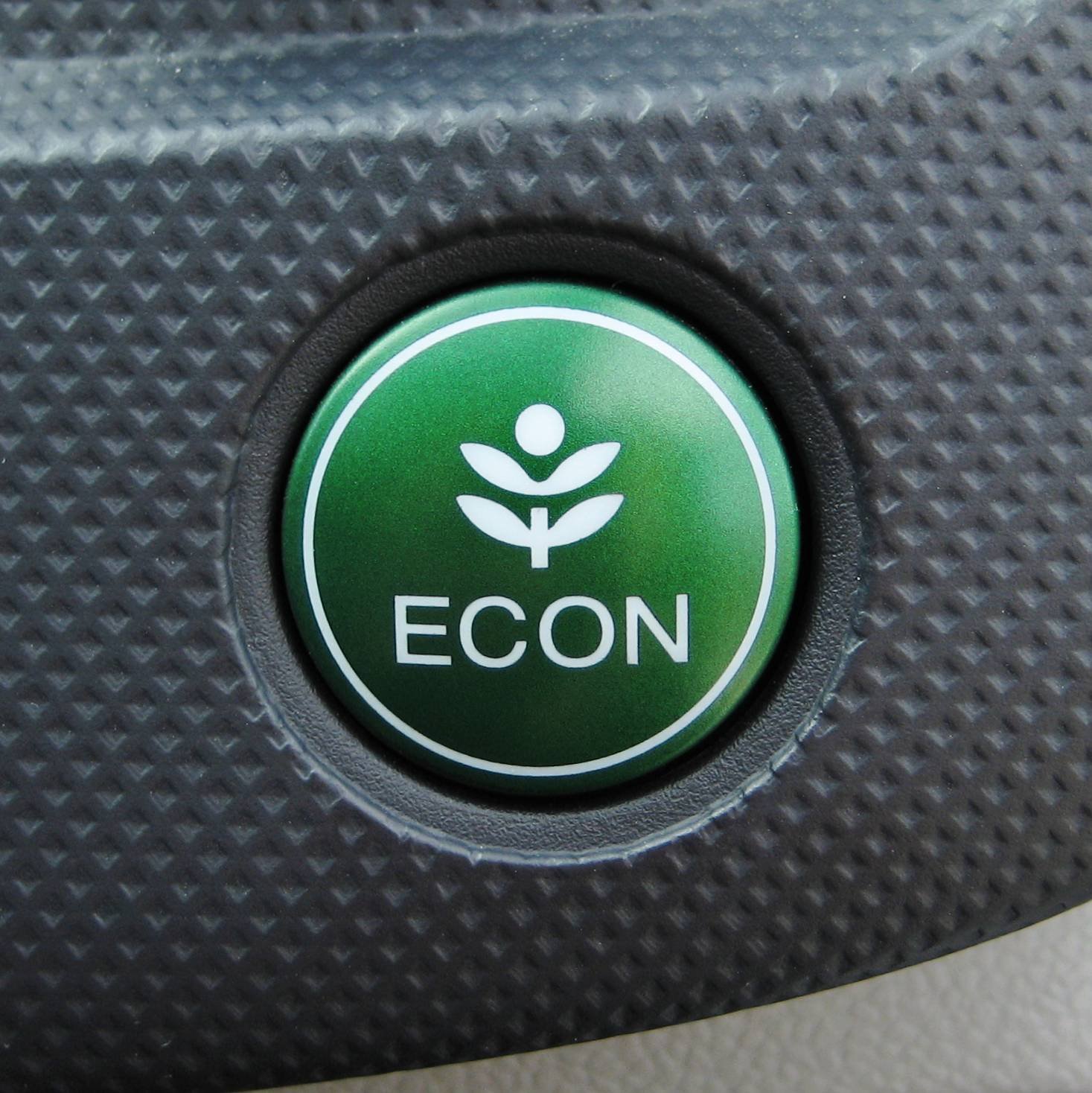 /assets/blog/2009_Honda_Insight_ECON_button.jpeg